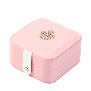 Pink PU leather jewelry box with gold crown crystal and white snap button closure