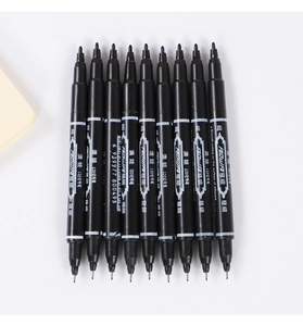 Row of dual-tip markers with fine and extra-fine tips for art and office work