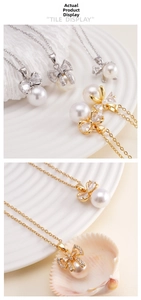 Detailed close-up of bowknot pearl necklace with cubic zirconia in gold and silver