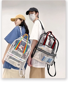 Detail view of transparent PVC backpacks with rainbow and striped shoulder straps