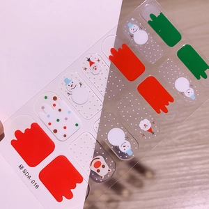 Détails des autocollants à ongles de Noël avec motifs de Père Noël et bonhomme de neige