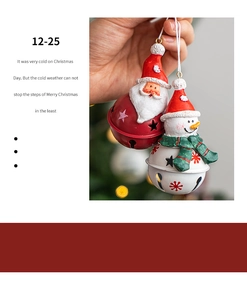 Detailed view of hand-held Santa and snowman metal Christmas bells with festive decorations