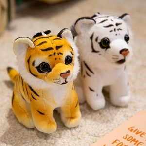 Cute stuffed tiger plush keychains in yellow and white fur with soft texture