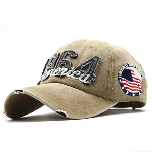 Cappellino da baseball kaki vintage con ricamo 1964 America e cotone lavato effetto usato