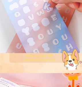 Close-up showing easy peeling of cream-colored English letter stickers for DIY journal