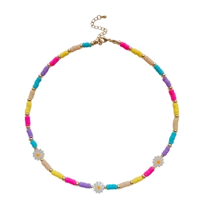 Bohemian daisy necklace with rainbow heishi clay beads and seashell accents for summer