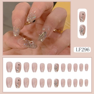 Detail of almond-shaped pink press-on nails with glitter and rhinestones LF296 set