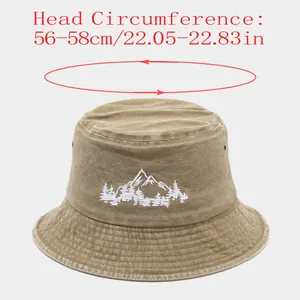 Cappello bucket in cotone lavato con ricamo montagna e guida misura testa