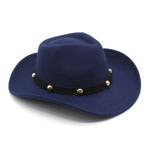 Classic dark blue felt western cowboy hat with studded leather band and jazz silhouette