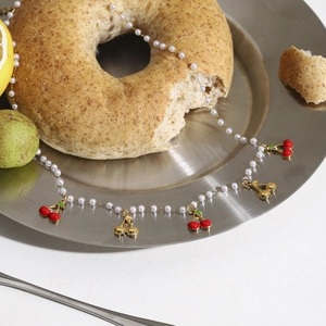 French pearl necklace with red cherry pendants and gold finish on creative bagel setting