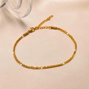Sparkling gold ankle bracelet with textured twist chain and lobster clasp for women