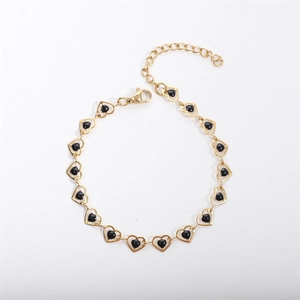 Elegant 18k gold plated stainless steel bracelet with black heart charms and lobster clasp