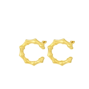 18K gold plated C-shape bamboo texture stainless steel hoop earrings on white background