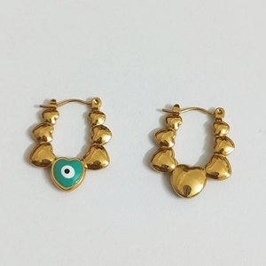 Elegant gold heart link hoop earrings with unique green eye heart charm details