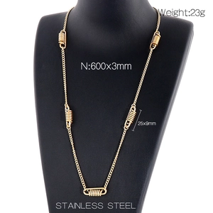 Golden stainless steel spring necklace on black mannequin for Korean fashion style
