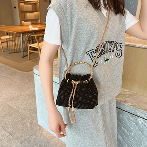 Black rhinestone bucket bag with gold metal handle and chain strap for women