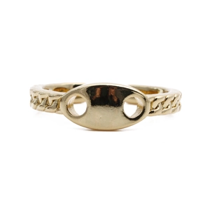Detail of gold Cuban chain ring featuring a hollow oval coffee bean design on top