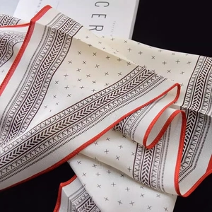 French style silk scarf with star prints, herringbone border and red hand-rolled edges