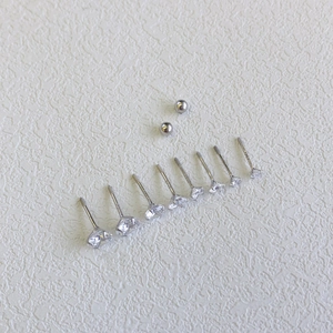 Macro shot of S925 sterling silver ear studs with 5A grade zircon geometric crystal heads