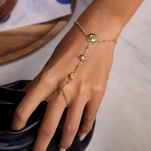 18K gold stainless steel celestial ring bracelet featuring sun, moon, and star charms