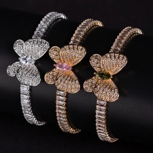 Luxury butterfly bracelet with zircon inlay available in silver, pink, and green accents