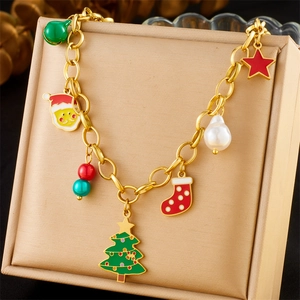 Golden stainless steel Christmas charm bracelet with enamel Santa and bell pendants