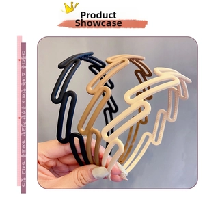 Close-up of wavy geometric matte headbands in black, coffee, and beige resin colors
