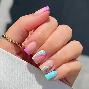 Detail of square press-on nails with pink French tips and colorful wavy lines design