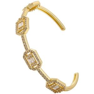 Elegant gold open cuff bracelet with hexagonal geometric charms and T-square zirconia gems