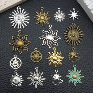 Detailed assortment of sun and cloud charms in gold, silver and bronze for DIY jewelry