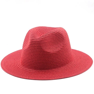 Classic bright red fedora straw hat with a wide brim and detailed woven texture for women