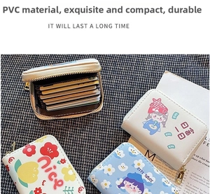Macro detail of cartoon PVC accordion card holder with multiple slots and zipper closure