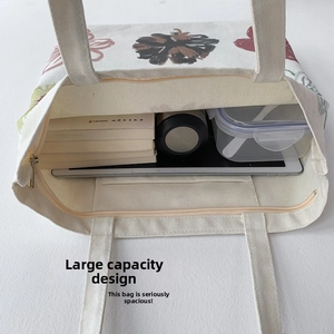 Detail view of spacious floral canvas tote bag showing interior storage capacity