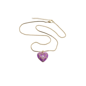 Detailed close-up of golden box chain necklace with purple heart evil eye pendant