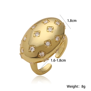 Detail of 18K gold plated ring featuring square-cut zircons and 1.8cm surface width
