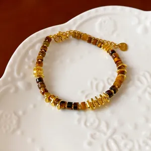 Retro tiger eye beaded bracelet with irregular gold spacers and lobster clasp
