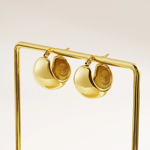 French vintage metallic spherical earrings in high-polished gold titanium steel