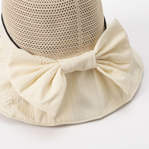 Women's summer hollow straw sun hat with large bow decoration and breathable wide brim