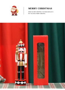 Classic 30cm wooden nutcracker king in red and gold uniform with festive window box