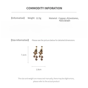 Size chart showing vintage bohemian tassel earrings with dimensions and copper material