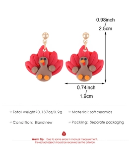 Detail showing dimensions of handmade polymer clay turkey earrings for Thanksgiving