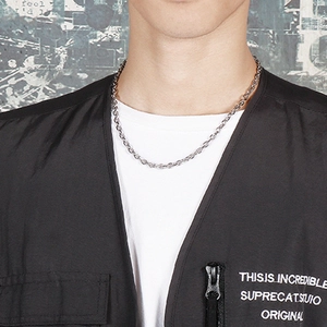 Minimalist silver stainless steel O-chain necklace shown on a model for daily wear