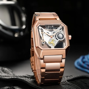 Detailed macro view of rose gold square skeleton watch with visible automatic movement