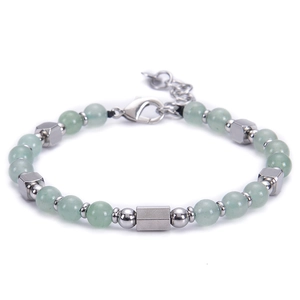 Detailed macro view of green turquoise beads and polished square stainless steel links