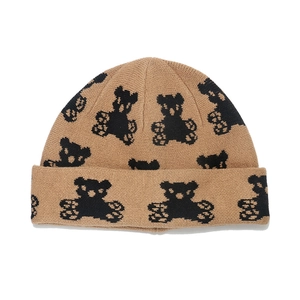 Brown knit beanie featuring cute black cartoon bear patterns for autumn and winter