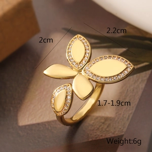 Macro shot showing dimensions of a 18K gold plated butterfly open ring with diamonds