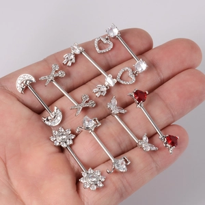 Assorted silver stainless steel nipple rings with heart, moon, and flower zircon designs
