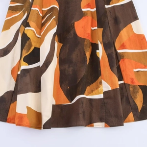 Poplin rok met abstracte bloemenprint in oranje en bruin met bijpassende riem