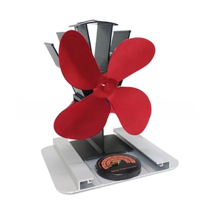 Close-up of red 4-blade heat powered stove fan with integrated thermometer