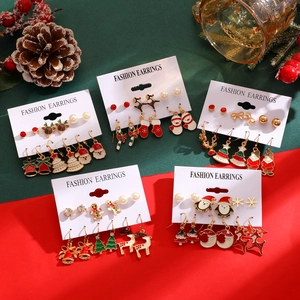 Detailed Christmas earring set featuring festive Santa, elk and snowflake crystal studs